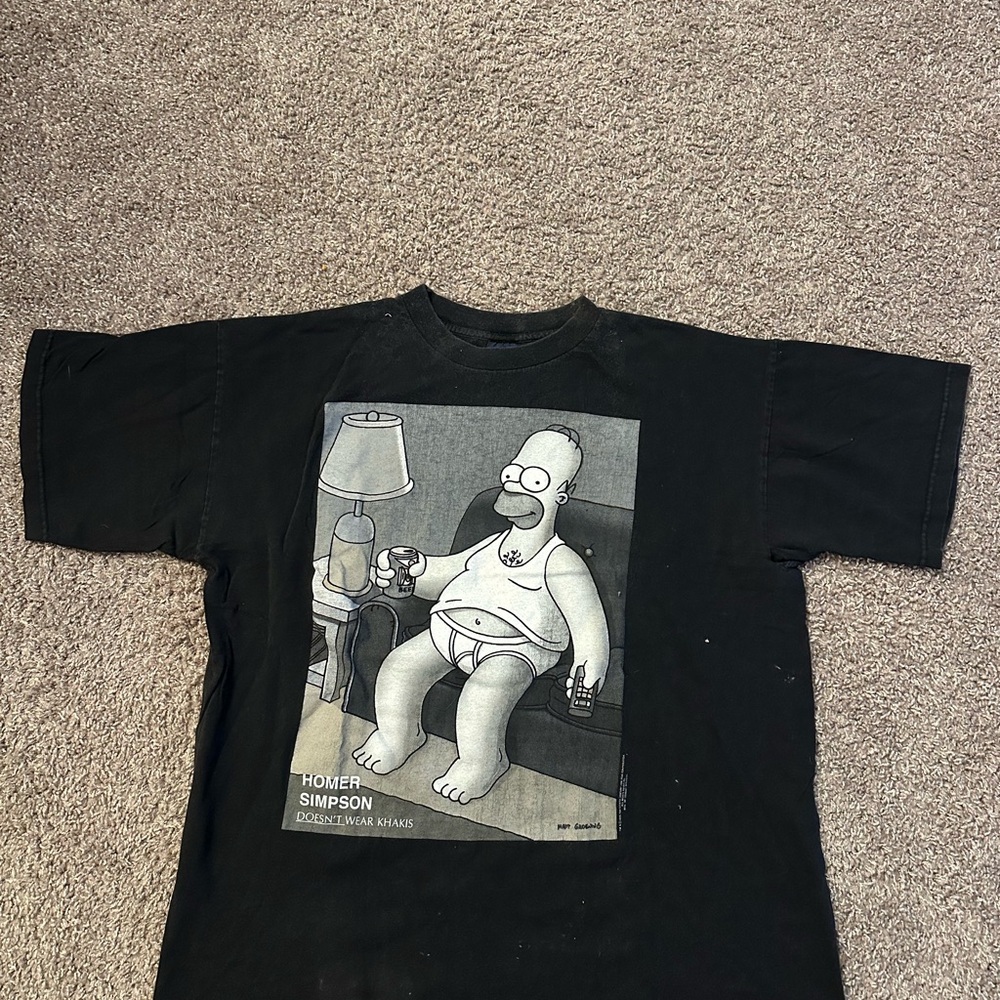 Black Graphic T-Shirt Featuring Iconic Cartoon Character